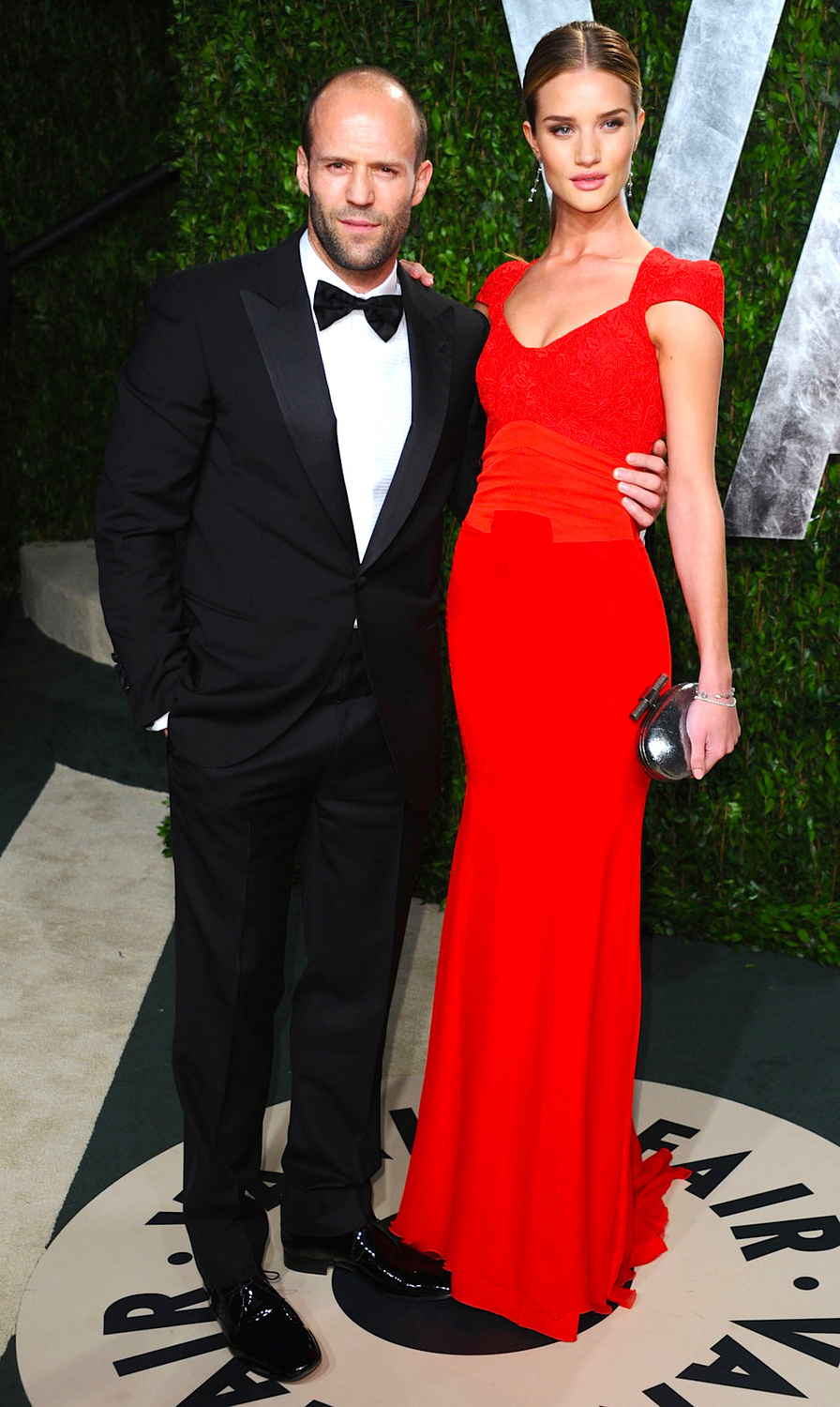 WEST HOLLYWOOD, CA - FEBRUARY 26: Actor Jason Statham (L) and actress Rosie Huntington-Whiteley arrives at the 2012 Vanity Fair Oscar Party hosted by Graydon Carter at Sunset Tower on February 26, 2012 in West Hollywood, California. (Photo by Alberto E. Rodriguez/Getty Images)