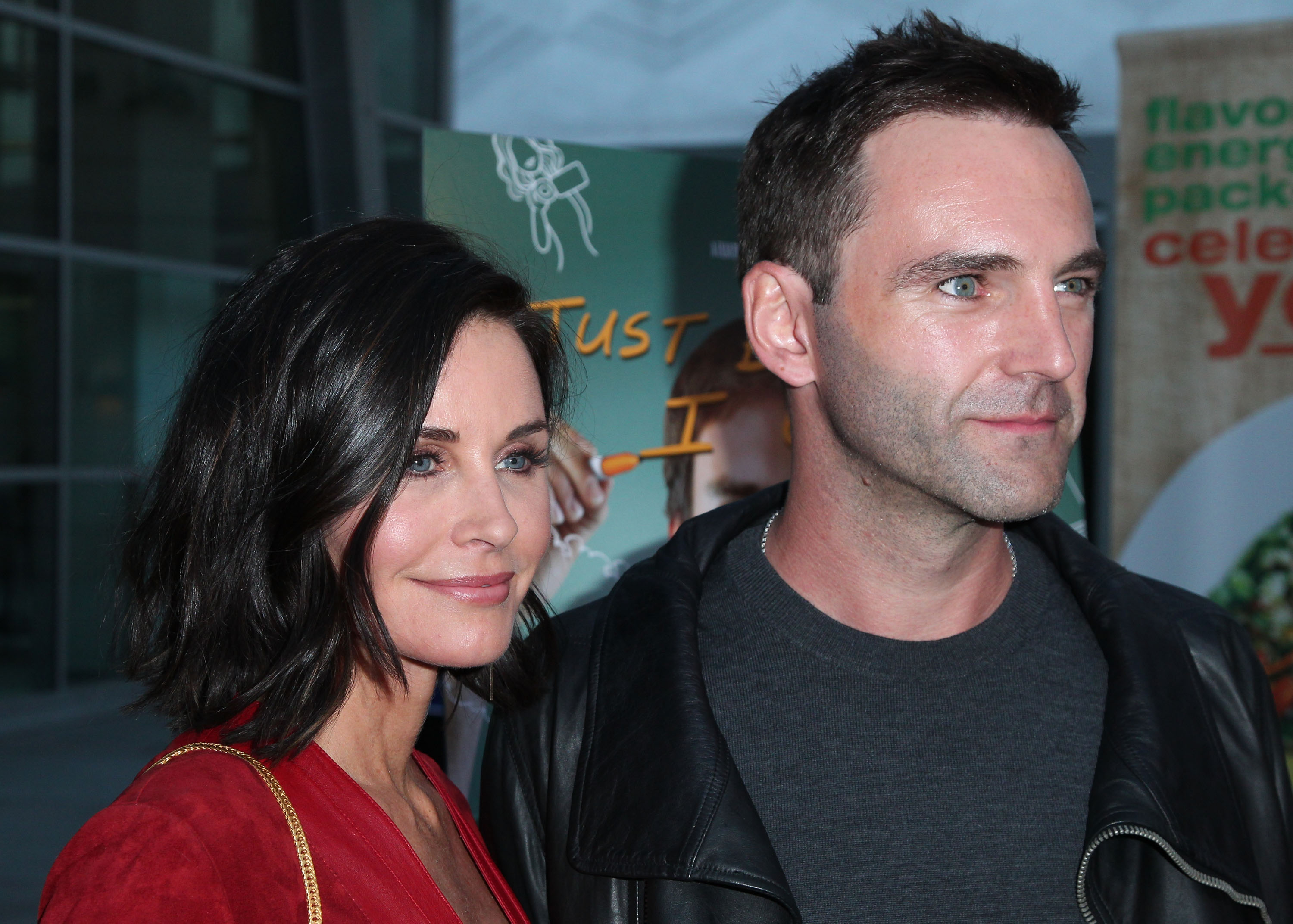 HOLLYWOOD, CA - APRIL 20: Actress/director Courteney Cox (L) and songwritwer Johnny McDaid attends the screening of Anchor Bay Entertainments Just Before I Go at ArcLight Hollywood on April 20, 2015 in Hollywood, California. (Photo by David Buchan/Getty Images)