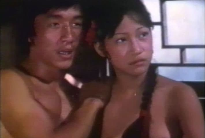 Кадр из эротического фильма с Джеки Чаном