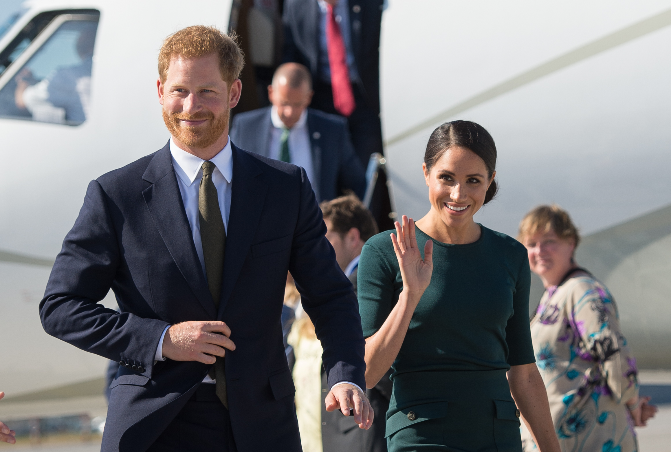 No shame: Meghan Markle and Prince Harry kiss during the polo tournament awards