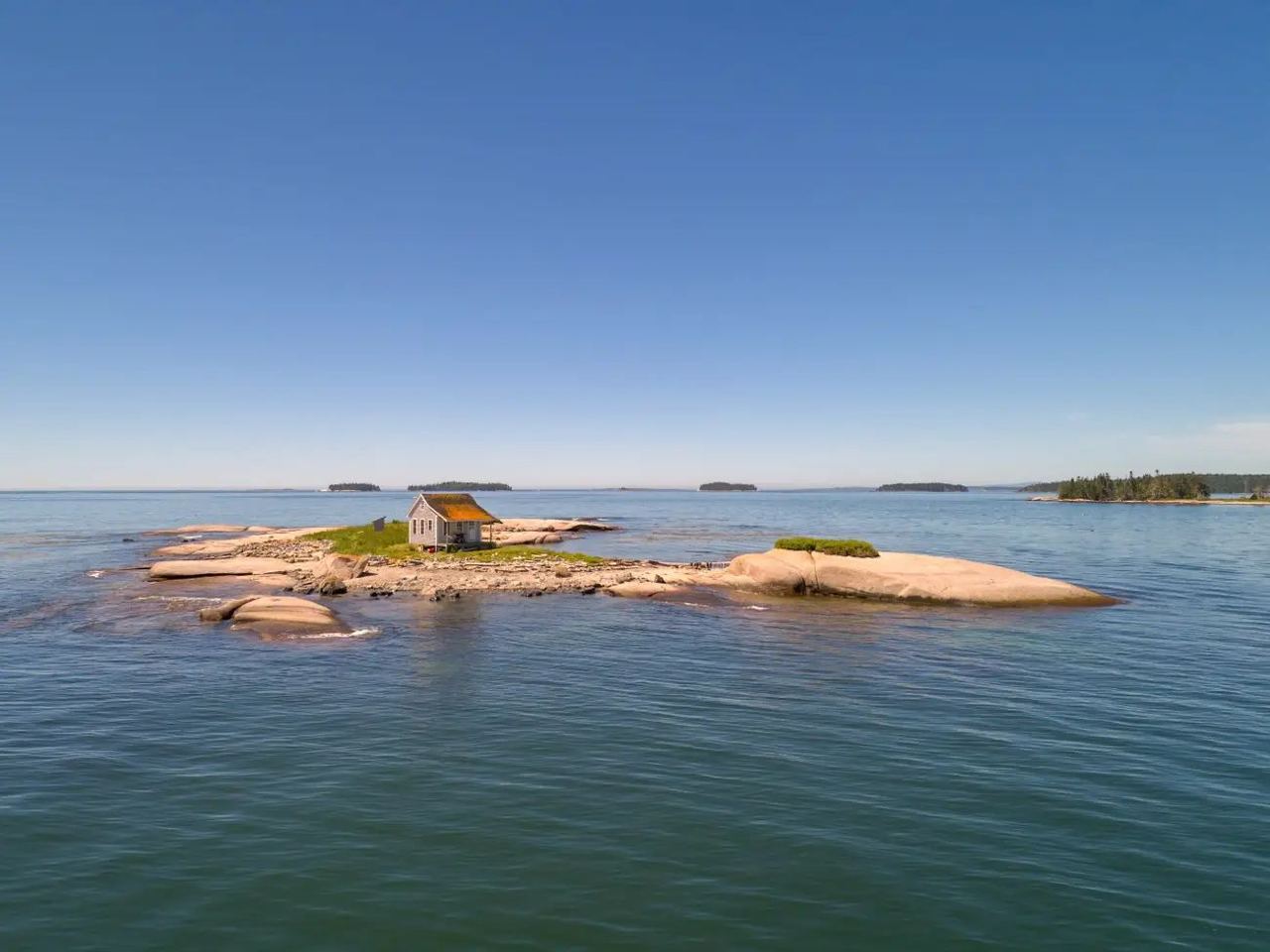 An American is selling an island with a home, but on one condition: the buyer must spend the night alone there.