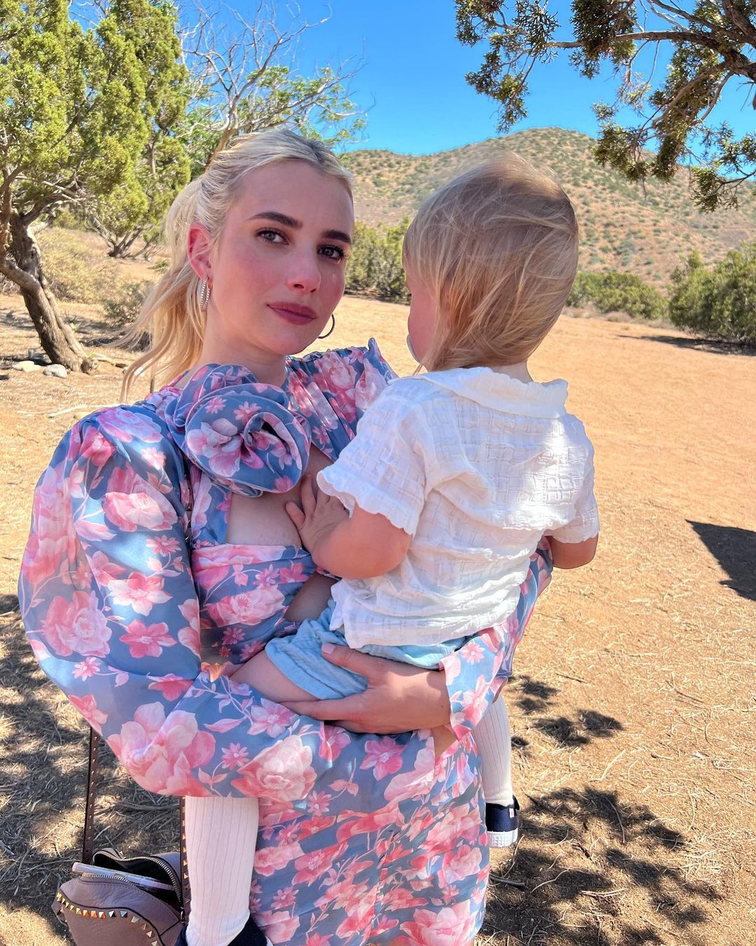 Floral slit dress: Emma Roberts shows how to combine two trends in one look