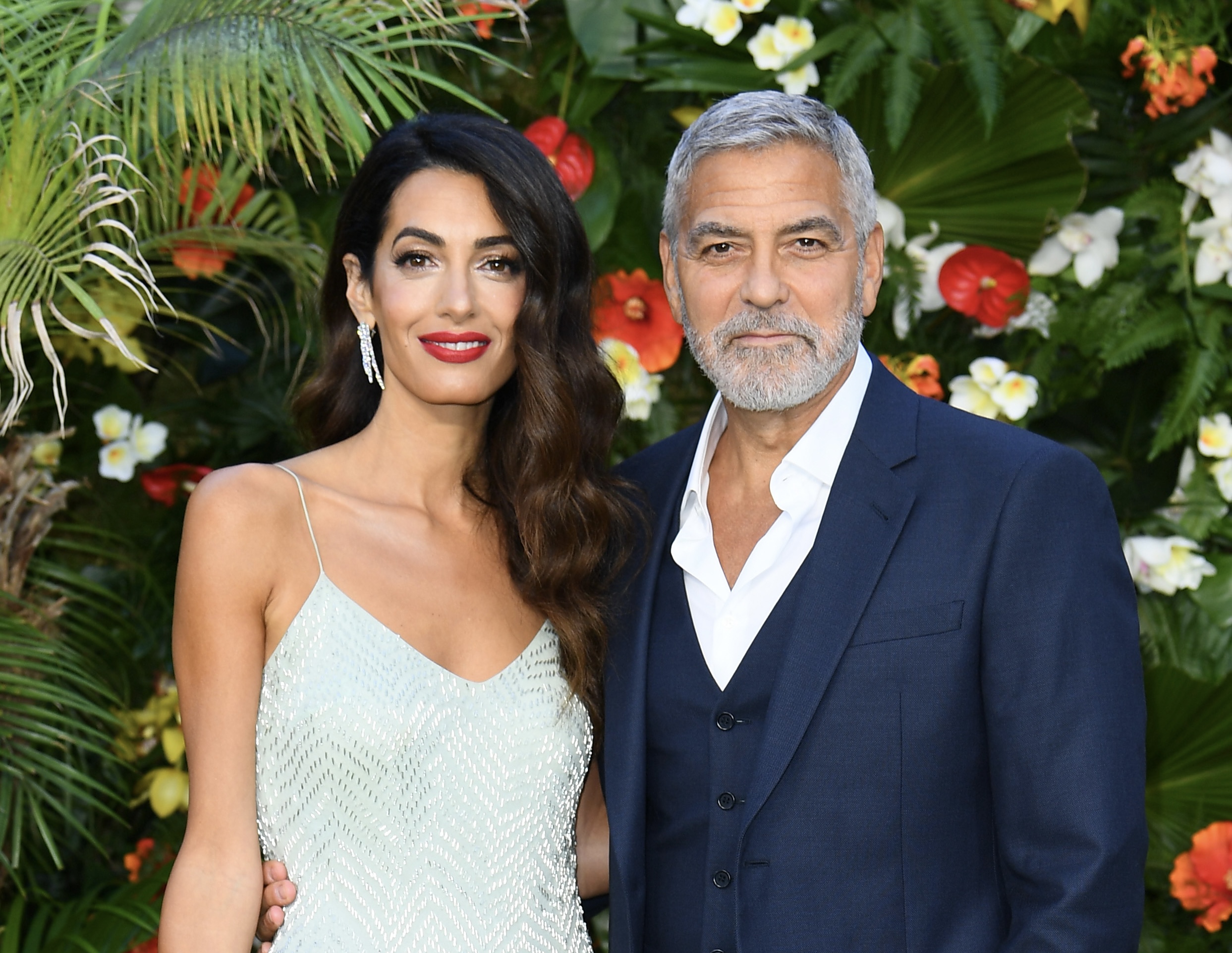 Elegance is her flair: Amal Clooney tried on a tight, floor-length dress with sparkly beads