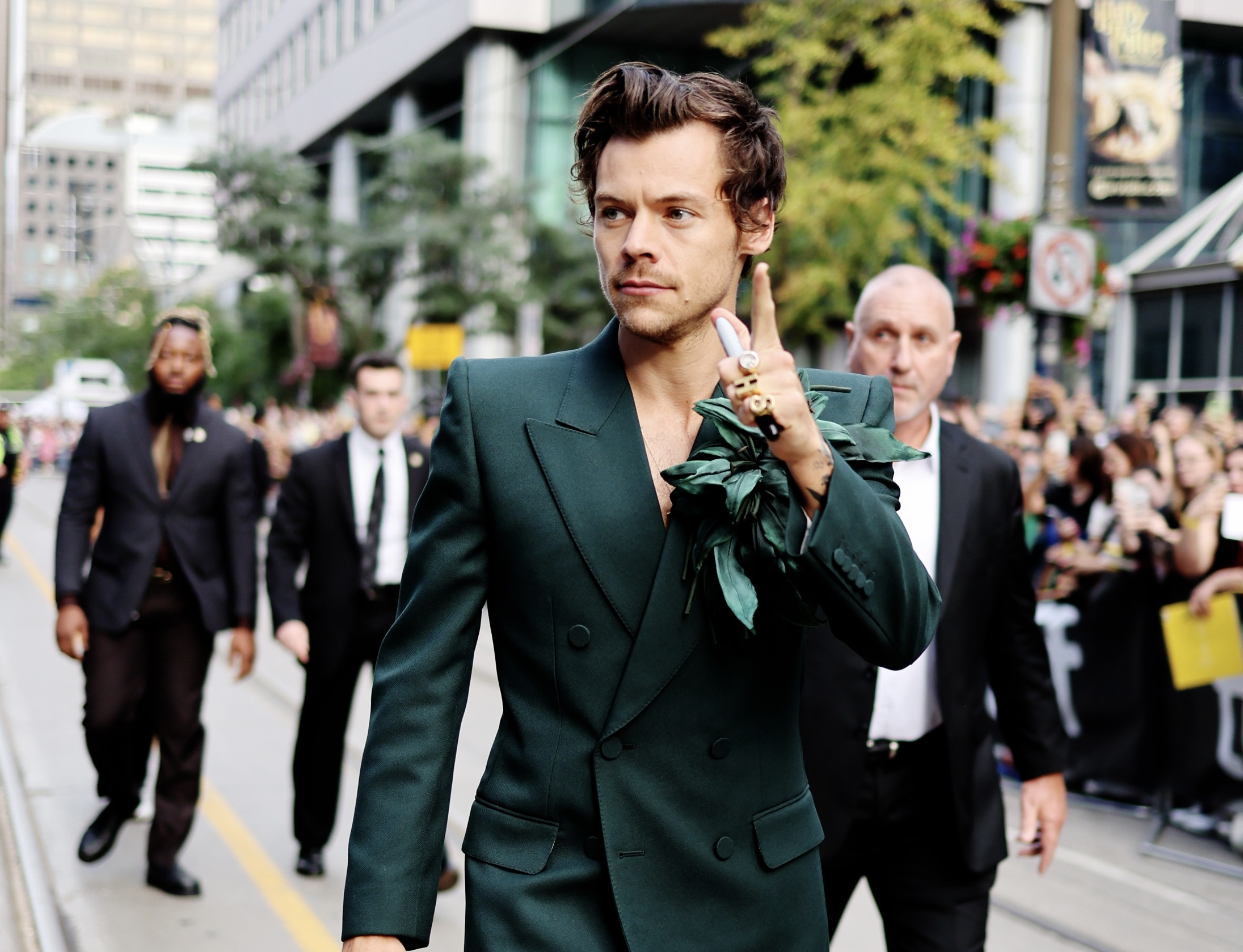 Floral nude jacket and heeled boots: Harry Styles once again proves his title as a major style icon